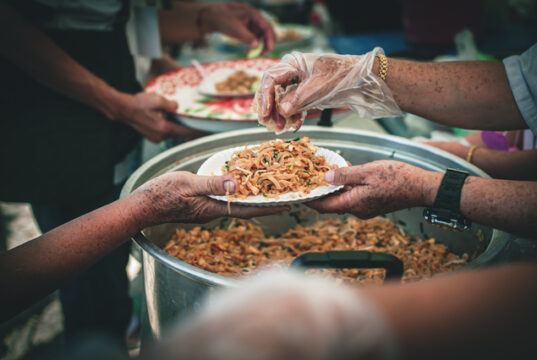 https://www.vecteezy.com/photo/44426704-volunteer-serving-food-to-the-homeless-in-the-community-charitable-donation-center-concept-of-free-food-assistance-service