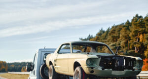 https://www.freepik.com/premium-photo/emergency-towing-service-action-highway-yellow-tow-truck-transports-damaged-car-flatbed-carrier-rear-view-vehicles-shows-brake-lights-motion-traffic_266312884.htm#fromView=search&page=1&position=10&uuid=a60ba5e0-d192-47a4-b74e-f92857f704f7&query=car+towed