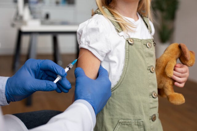 2149187465 https://www.freepik.com/free-photo/male-pediatrician-administering-vaccine-his-office_20553633.htm#fromView=search&page=1&position=14&uuid=d8babd27-3071-40d6-bb5a-6751ac1a2abe&query=child+vaccination