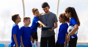 https://www.freepik.com/free-photo/trainer-talking-players-front-view_32499614.htm#fromView=search&page=1&position=2&uuid=35745a8a-c94c-46f0-85ab-f23976a803b4&query=junior+soccer+coach