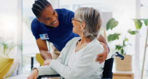 https://www.freepik.com/premium-photo/black-man-caregiver-old-woman-wheelchair-talking-speaking-homecare-rehabilitation-together-medical-healthcare-advice-male-nurse-nursing-helping-elderly-patient-with-disability_73734075.htm#fromView=search&page=1&position=19&uuid=7b5d3c2f-04a5-4482-ab82-ca4775064932&query=elder+person+and+aide