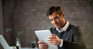https://www.freepik.com/free-photo/happy-entrepreneur-using-digital-tablet-reading-something-while-working-office_25591402.htm#fromView=search&page=1&position=38&uuid=7e5a1f52-a4f6-43fd-8d45-eb71626b88bf&query=investor