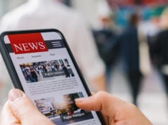 https://www.freepik.com/premium-photo/online-news-mobile-phone-close-up-businesswoman-reading-news-articles-smartphone-screen-application-hand-holding-smart-device-mockup-website-newspaper-portal-internet_28376740.htm#fromView=search&page=1&position=14&uuid=6dc8aae1-dd57-495f-92f6-5426f90c3fed&query=digital+newspaper