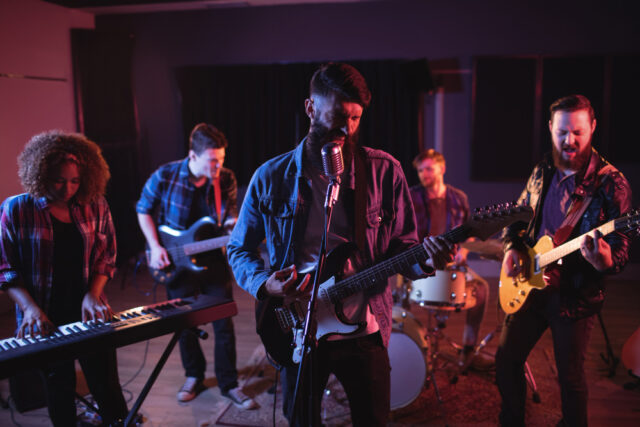 https://www.freepik.com/free-photo/band-performing-studio_11183978.htm#fromView=search&page=1&position=0&uuid=6fb0ea3b-415f-4814-9e15-c0bc441804c4&query=musical+band