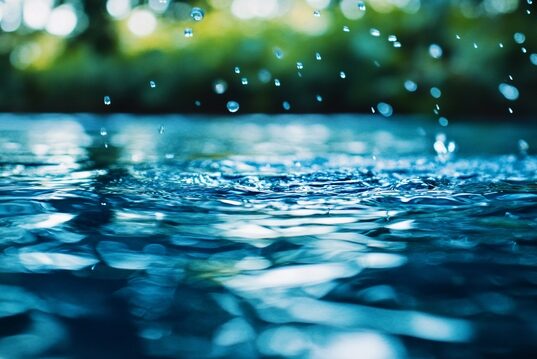 https://www.vecteezy.com/photo/54451430-a-body-of-water-with-raindrops-falling-on-it