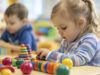 https://www.vecteezy.com/photo/50002597-cute-little-girl-playing-with-colorful-wooden-toys-in-kindergarten