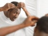 https://www.vecteezy.com/photo/52031493-dandruff-problem-worried-african-american-man-looking-at-flaky-scalp-in-mirror-touching-head-examining-gray-hair-and-hairloss-issue-standing-in-bathroom-at-home-men-s-beauty-and-haircare-treatment