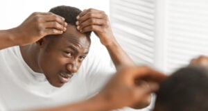 https://www.vecteezy.com/photo/52031493-dandruff-problem-worried-african-american-man-looking-at-flaky-scalp-in-mirror-touching-head-examining-gray-hair-and-hairloss-issue-standing-in-bathroom-at-home-men-s-beauty-and-haircare-treatment
