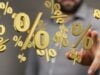 https://www.vecteezy.com/photo/70685742-floating-percentage-symbols-with-blurred-hand-visualizing-financial-interest-rates-and-discounted-offers-concept