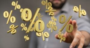 https://www.vecteezy.com/photo/70685742-floating-percentage-symbols-with-blurred-hand-visualizing-financial-interest-rates-and-discounted-offers-concept