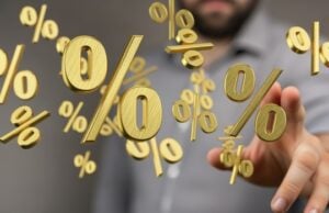 https://www.vecteezy.com/photo/70685742-floating-percentage-symbols-with-blurred-hand-visualizing-financial-interest-rates-and-discounted-offers-concept