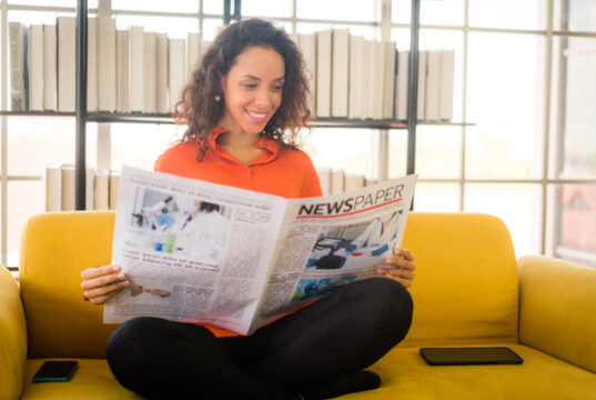 https://www.vecteezy.com/photo/4851514-latin-america-woman-reading-newspaper-on-sofa