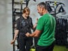 https://www.vecteezy.com/photo/35784385-muscular-fitness-instructor-is-putting-on-an-ems-suit-for-athletic-woman-training-in-a-gym-by-a-method-to-increase-energy