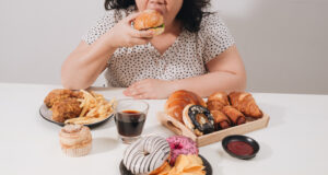 https://www.freepik.com/premium-photo/curvy-female-preparing-eat-hamburger-overeating-problem-depression_16955744.htm#from_element=cross_selling__photo