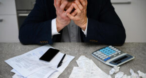 https://www.freepik.com/premium-photo/worried-man-calculating-budget-finances_33748894.htm#fromView=image_search&page=1&position=16&uuid=8856162f-0ba3-497c-a859-9d3070390a51&query=Financial+debt