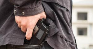 https://www.freepik.com/premium-photo/midsection-thief-removing-gun-from-back-pocket_121844179.htm#fromView=search&page=1&position=43&uuid=b1c72f6c-5c0a-4616-b787-dbe461229052&query=comcealed+carry