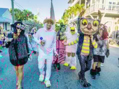 Costumed Crowds Pack Key West Streets for Fantasy Fest Masquerade March