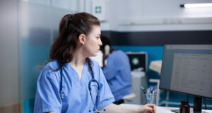 https://www.freepik.com/free-photo/caucasian-nurse-checking-appointments-list-computer-monitor-sitting-clinic-desk-focused-adult-woman-healthcare-expert-working-medical-office-with-stethoscope-around-neck_51112275.htm#fromView=search&page=1&position=7&uuid=fb393ccc-00d1-4187-9270-ede2e328a5fe&query=nurse+computer