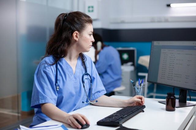 Nurse checking appointments https://www.freepik.com/free-photo/caucasian-nurse-checking-appointments-list-computer-monitor-sitting-clinic-desk-focused-adult-woman-healthcare-expert-working-medical-office-with-stethoscope-around-neck_51112275.htm#fromView=search&page=1&position=7&uuid=fb393ccc-00d1-4187-9270-ede2e328a5fe&query=nurse+computer