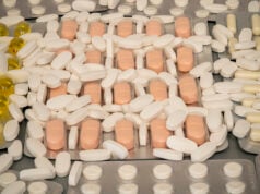 https://www.vecteezy.com/photo/55626756-a-collection-of-assorted-pills-and-capsules-is-spread-over-a-flat-surface