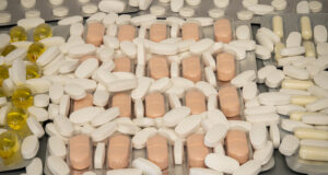 https://www.vecteezy.com/photo/55626756-a-collection-of-assorted-pills-and-capsules-is-spread-over-a-flat-surface