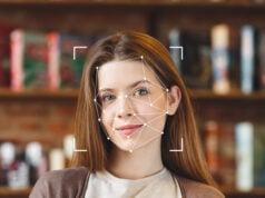 https://www.vecteezy.com/photo/54857442-a-young-woman-smiles-as-facial-recognition-technology-analyzes-her-features-in-a-library-surrounded-by-books-the-focus-is-on-her-face-highlighting-advanced-id-technology-in-use