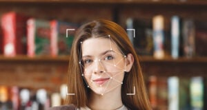 https://www.vecteezy.com/photo/54857442-a-young-woman-smiles-as-facial-recognition-technology-analyzes-her-features-in-a-library-surrounded-by-books-the-focus-is-on-her-face-highlighting-advanced-id-technology-in-use