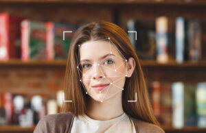 https://www.vecteezy.com/photo/54857442-a-young-woman-smiles-as-facial-recognition-technology-analyzes-her-features-in-a-library-surrounded-by-books-the-focus-is-on-her-face-highlighting-advanced-id-technology-in-use