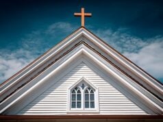 https://www.vecteezy.com/photo/71132751-church-steeple-and-window-against-a-dramatic-blue-sky