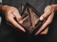 https://www.vecteezy.com/photo/3018550-close-up-of-man-hands-holding-and-empty-wallet-no-money