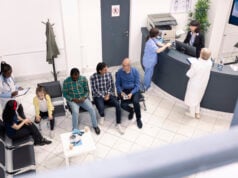 https://www.vecteezy.com/photo/71392094-diverse-people-seated-in-waiting-room-preparing-for-clinical-consultations-elderly-man-and-asian-guy-engage-in-conversation-as-black-female-doctor-records-data-of-mom-and-daughter-in-hospital-lobby