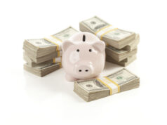 https://www.vecteezy.com/photo/16373416-pink-piggy-bank-with-stacks-of-money