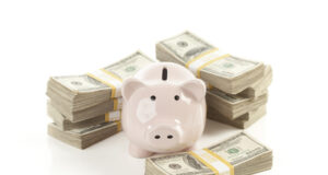 https://www.vecteezy.com/photo/16373416-pink-piggy-bank-with-stacks-of-money