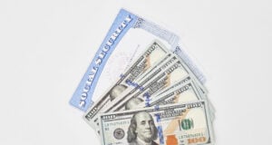 https://www.vecteezy.com/photo/31176074-social-security-card-and-us-dollars-cash-money