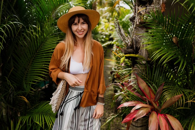 https://www.vecteezy.com/photo/32628945-well-dressed-woman-in-perfect-mood-playfully-posing-in-tropical-garden-bali-holidays-boho-accessories