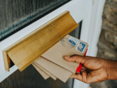 https://www.freepik.com/free-photo/woman-picking-up-mail_18946811.htm#fromView=search&page=1&position=0&uuid=a2135435-5ecd-497f-9f18-6aad79d2edd1&query=USPS