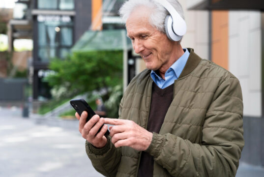 https://www.freepik.com/free-photo/smiley-older-man-city-listening-music-headphones_15000505.htm#fromView=search&page=1&position=36&uuid=5803b861-2e45-4b93-aaab-29b1a417aa6b&query=senior+on+cellphone