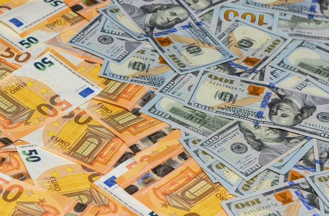 https://www.vecteezy.com/photo/70986423-background-of-dollars-and-euros-for-financial-market-1