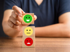 https://www.vecteezy.com/photo/53274275-good-feedback-rating-and-positive-customer-review-the-client-handpicked-the-happy-face-smile-icon-on-the-wooden-cube-over-the-table