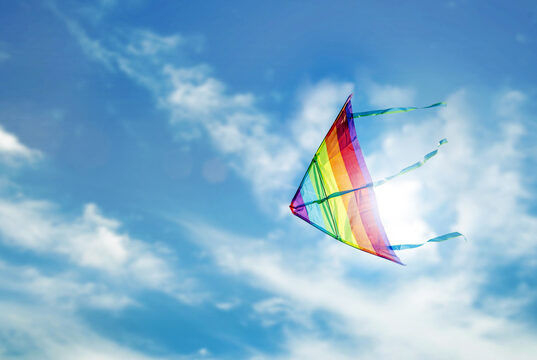 https://www.vecteezy.com/photo/6863698-rainbow-kite-flying-in-blue-sky-with-cloud