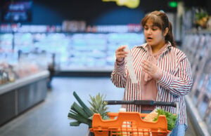 https://www.vecteezy.com/photo/73943998-shocked-indian-woman-checking-grocery-receipt-in-supermarket
