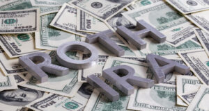 https://www.vecteezy.com/photo/12634251-the-words-roth-ira-laid-with-aluminium-letters-on-the-us-dollar-banknotes-background-with-selective-focus