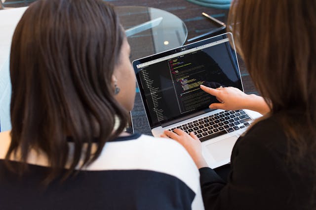 https://www.pexels.com/photo/two-women-looking-at-the-code-at-laptop-1181263/