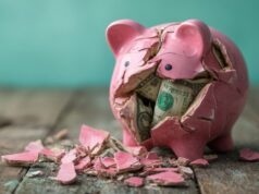 https://www.vecteezy.com/photo/70687103-broken-pink-piggy-bank-filled-with-us-dollar-bills-on-a-weathered-wooden-surface-financial-loss