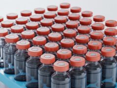 https://www.vecteezy.com/photo/70586181-dense-grid-of-clear-glass-medical-vials-with-bright-red-caps-on-a-blue-tray