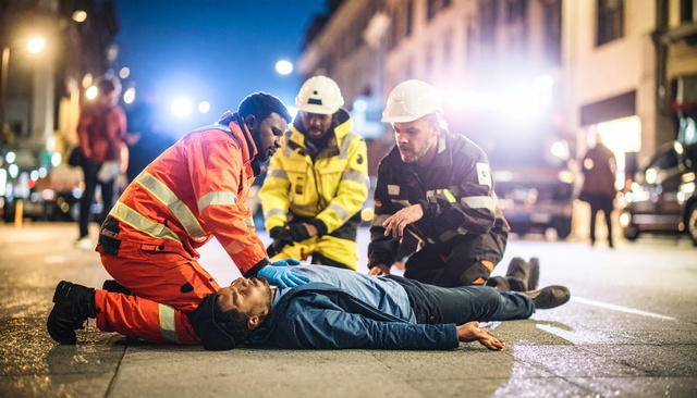 https://www.vecteezy.com/photo/69823258-first-responders-aid-injured-man-on-city-street-at-night