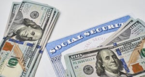 https://www.vecteezy.com/photo/31176112-social-security-card-and-us-dollars-cash-money