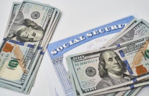https://www.vecteezy.com/photo/31176112-social-security-card-and-us-dollars-cash-money