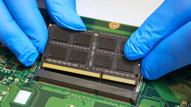 https://www.vecteezy.com/photo/74397216-technician-installing-ram-module-on-motherboard