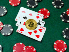 https://www.vecteezy.com/photo/70699055-three-playing-cards-are-prominently-displayed-with-a-bitcoin-chip-on-top-surrounding-them-are-poker-chips-in-red-black-and-white-creating-a-vibrant-gaming-atmosphere